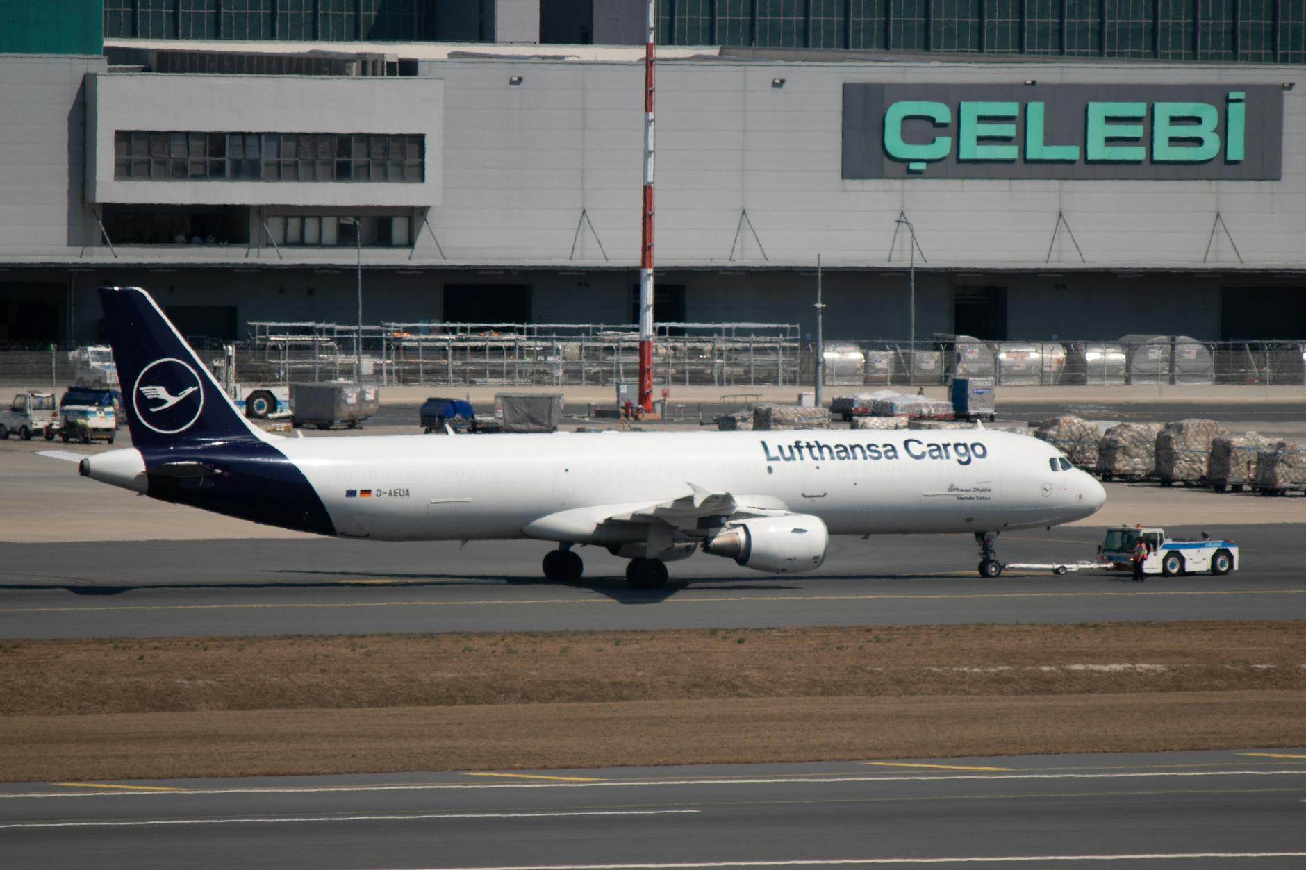 Lufthansa Cargo airplane being towed at Istanbul Airport in Türkiye.
